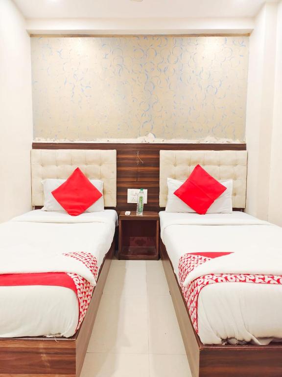 Postel nebo postele na pokoji v ubytování Hotel Avion Park - Near Mumbai International Airport