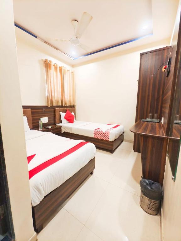 Postel nebo postele na pokoji v ubytování Hotel Avion Park - Near Mumbai International Airport