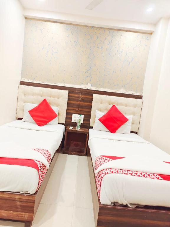 Postel nebo postele na pokoji v ubytování Hotel Avion Park - Near Mumbai International Airport