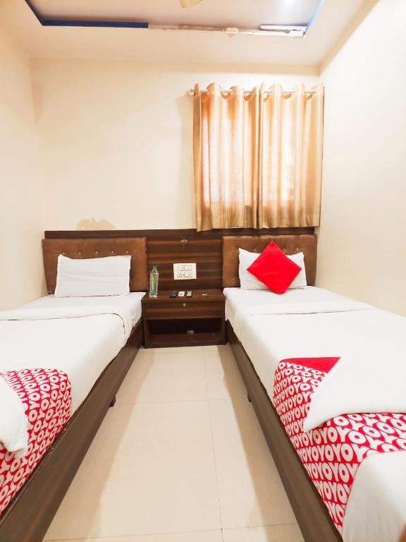 Postel nebo postele na pokoji v ubytování Hotel Avion Park - Near Mumbai International Airport