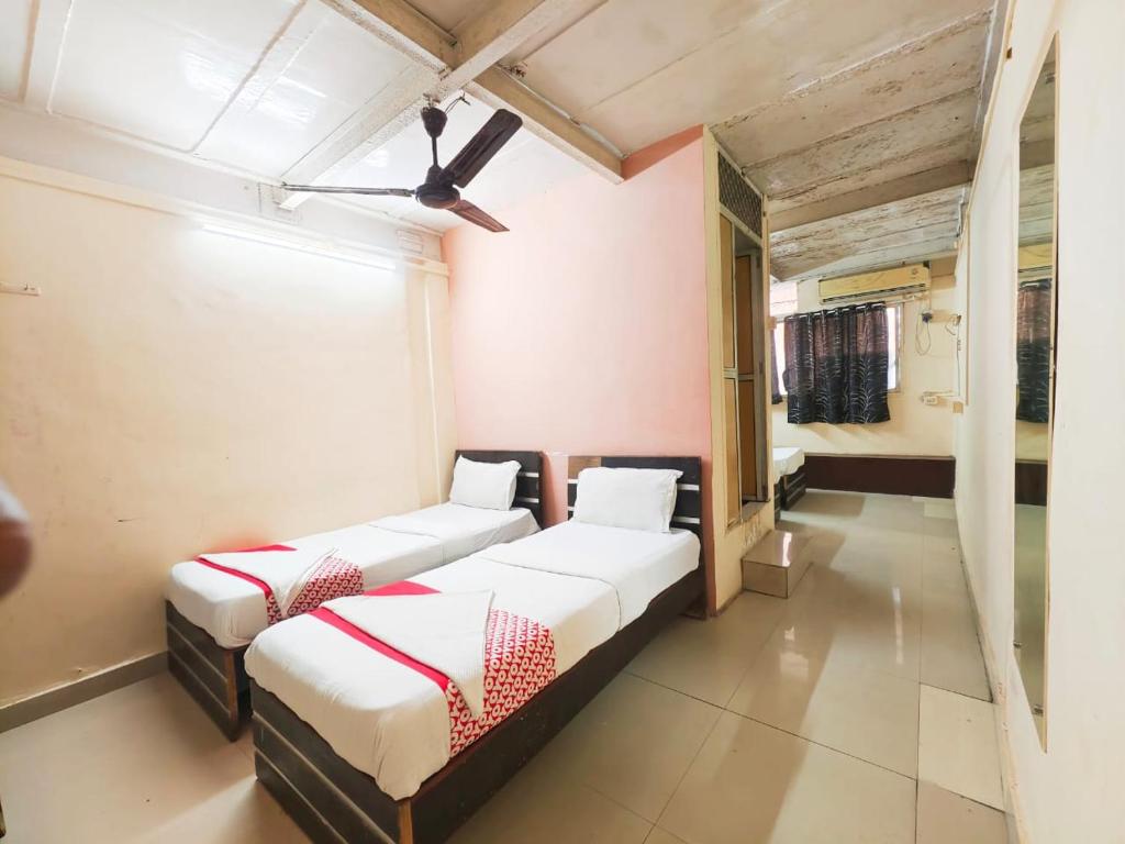 Postel nebo postele na pokoji v ubytování Hotel Avion Park - Near Mumbai International Airport