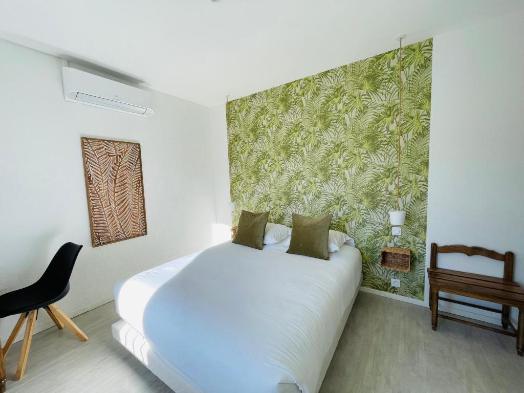 Postel nebo postele na pokoji v ubytování Hôtel La Bastide de Vaison