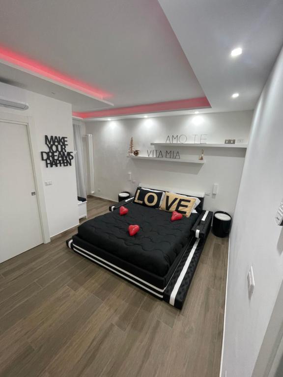 Posteľ alebo postele v izbe v ubytovaní Due Cuori Suite