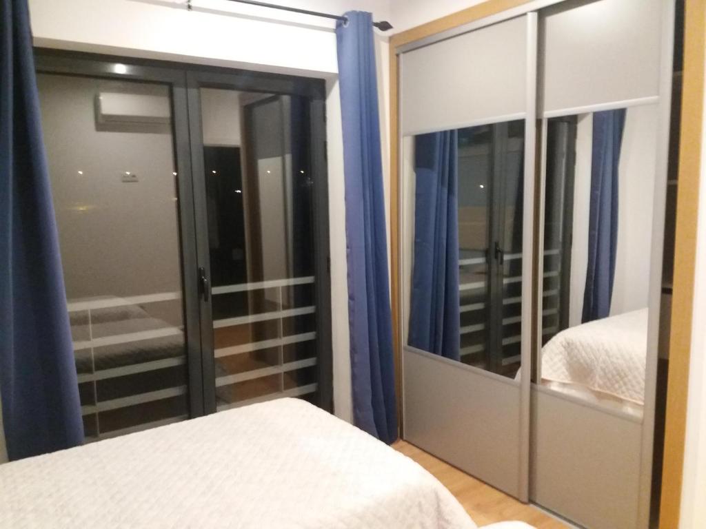 Postel nebo postele na pokoji v ubytování LPA PEREIRA Hotel restaurante