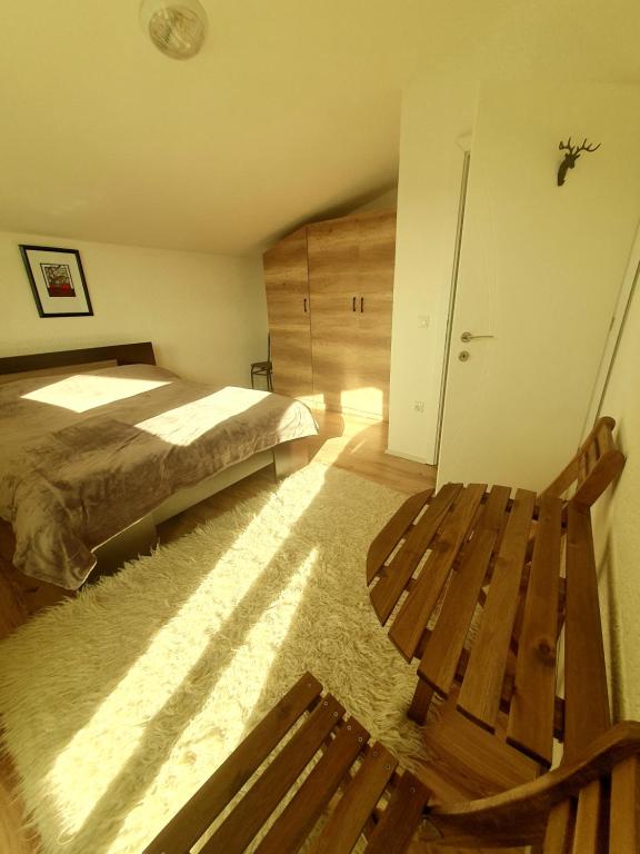 Postel nebo postele na pokoji v ubytování Villa Winterfell Popova Shapka