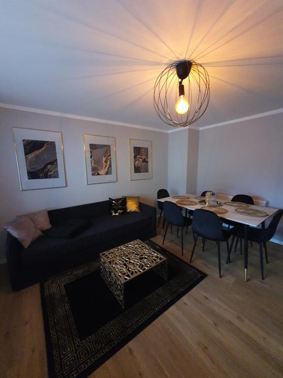Posezení v ubytování Ferienhaus am Naherholungsgebiet mit SAUNA