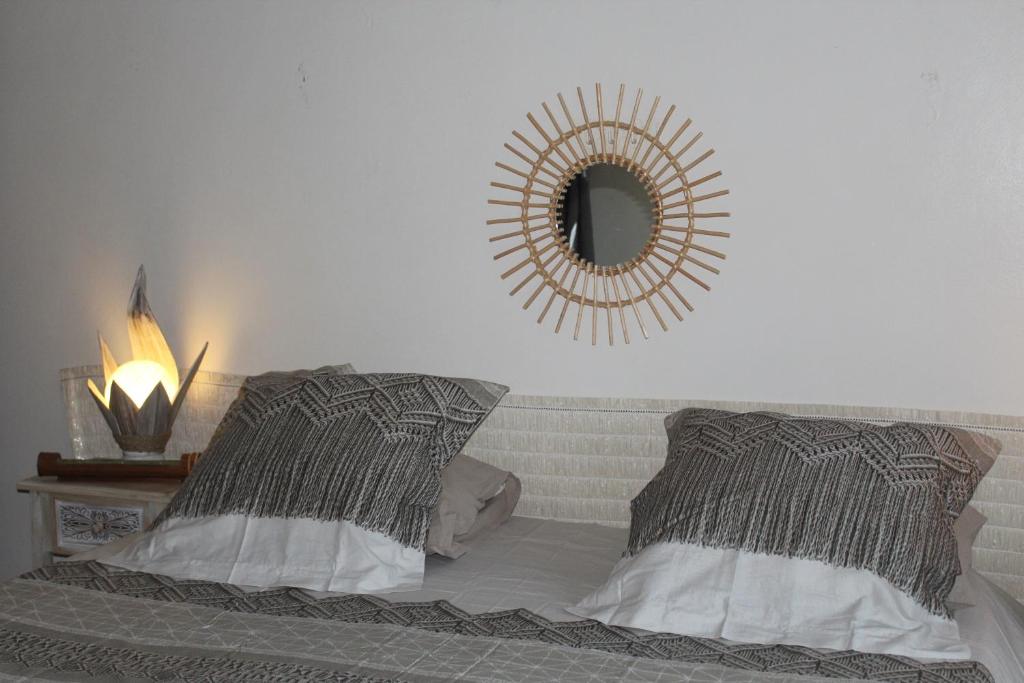 A bed or beds in a room at HIME LODGE