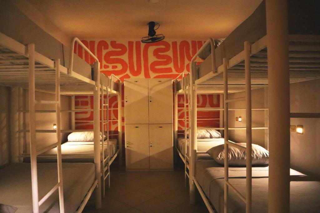 Postel nebo postele na pokoji v ubytování 3B Wellness Hotel & Hostel Adults Only