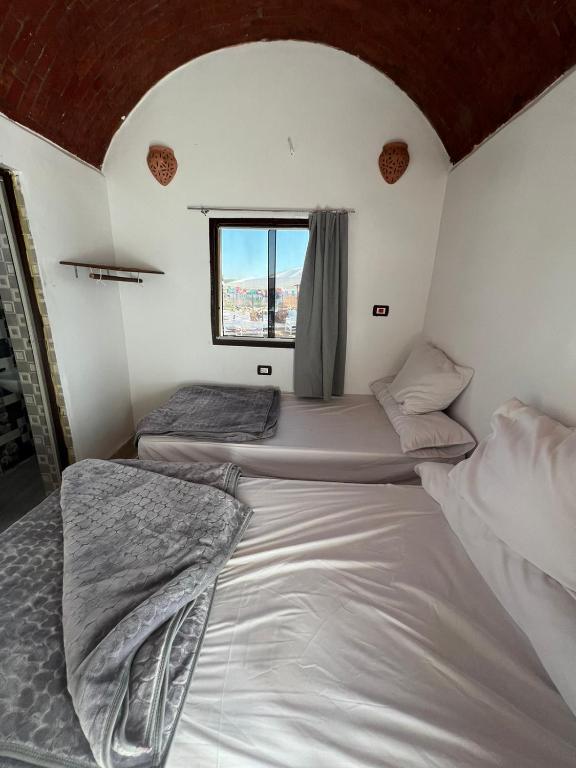 Letto o letti in una camera di Torya Nubian House