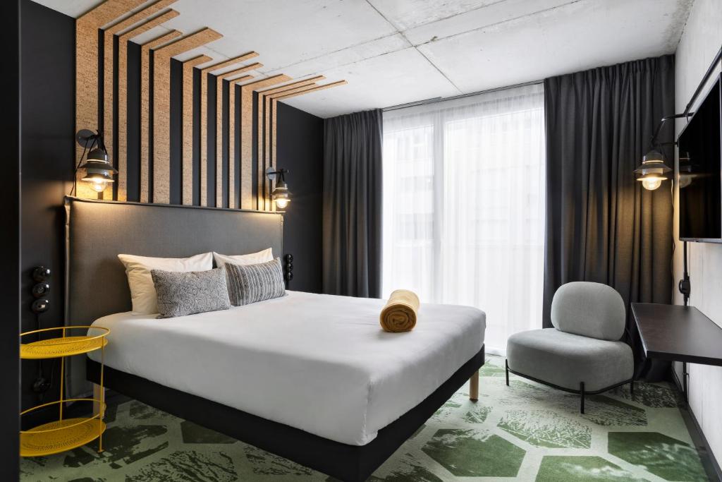 Postel nebo postele na pokoji v ubytování ibis Styles Amiens Centre