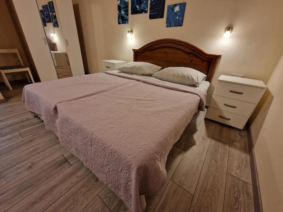 Postel nebo postele na pokoji v ubytování Lavanda apartman 2