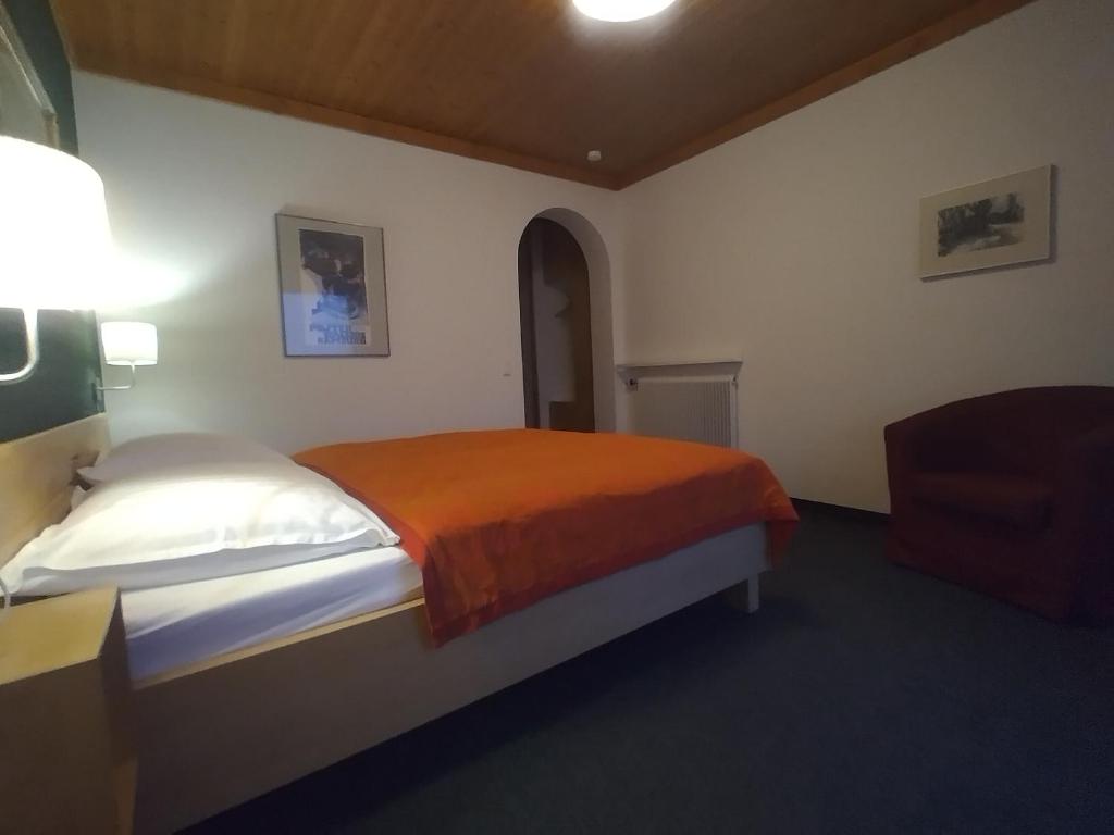 Ein Bett oder Betten in einem Zimmer der Unterkunft Seeblick-Appartements Ossiach