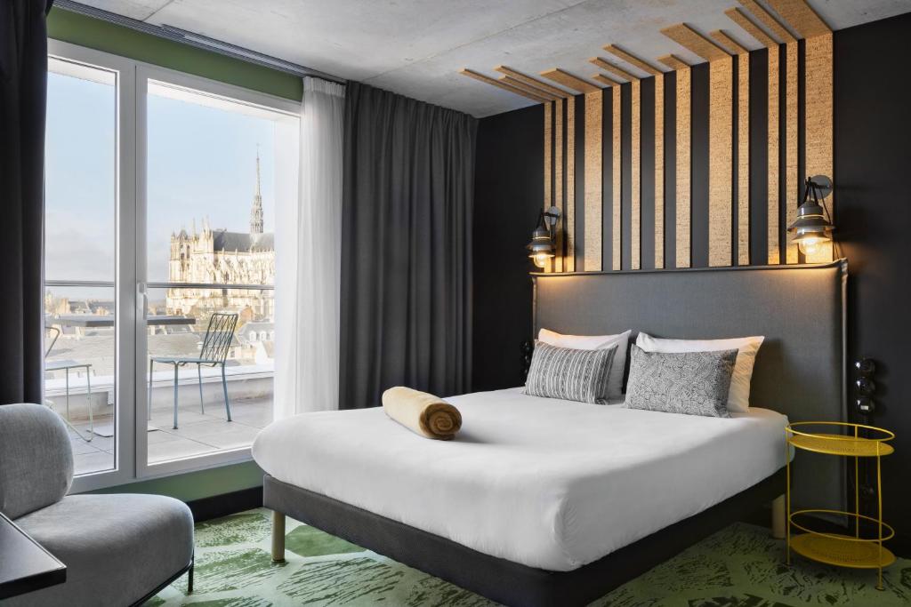 Postel nebo postele na pokoji v ubytování ibis Styles Amiens Centre