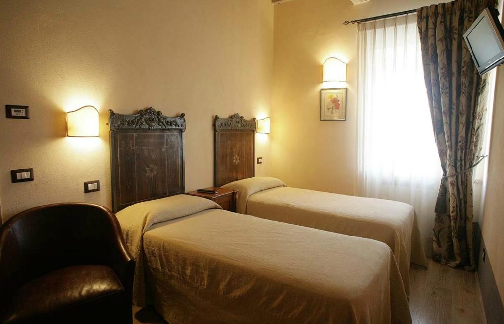 Posteľ alebo postele v izbe v ubytovaní Agriturismo La Sovana