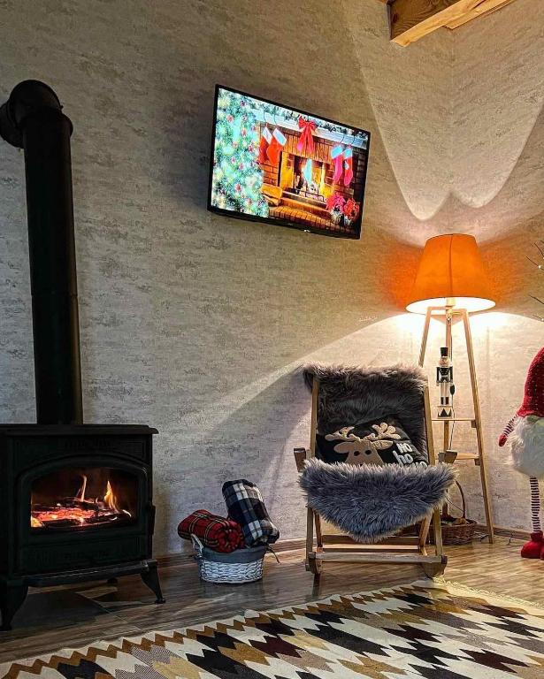 TV a/nebo společenská místnost v ubytování Iano