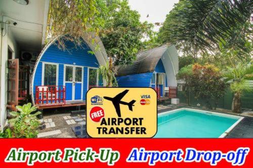 a sign in front of a house with a swimming pool at A4 Residence Colombo Airport -by A4 Transit Hub & Airport J Dream Resort - free pickup & drop Shuttle Serviceトランジットホテル in Katunayake