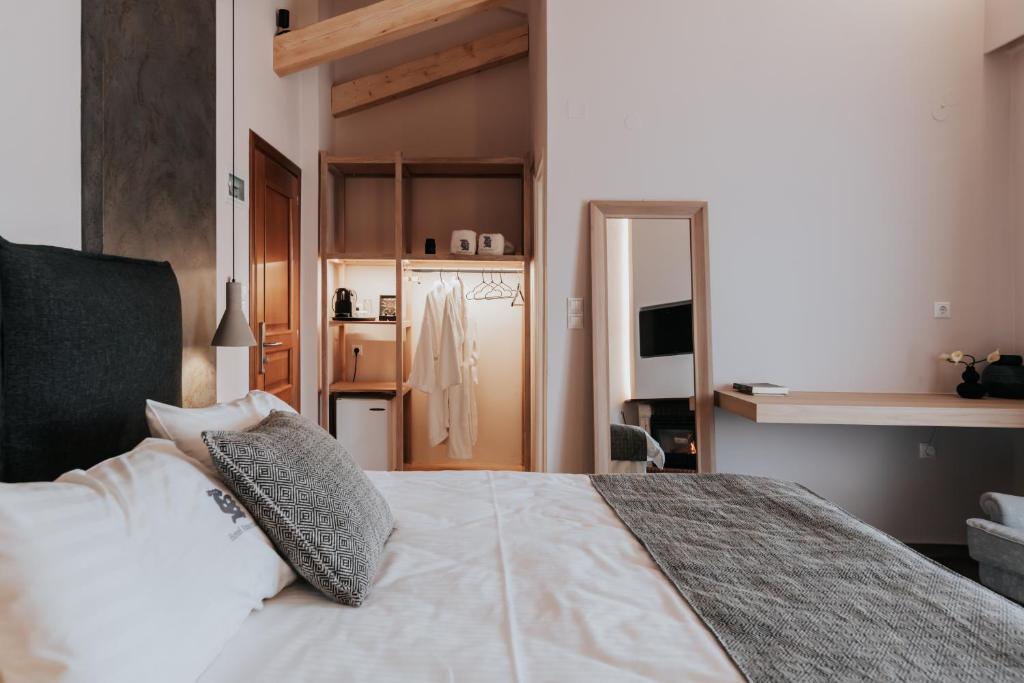 Ένα ή περισσότερα κρεβάτια σε δωμάτιο στο Anerada Hotel