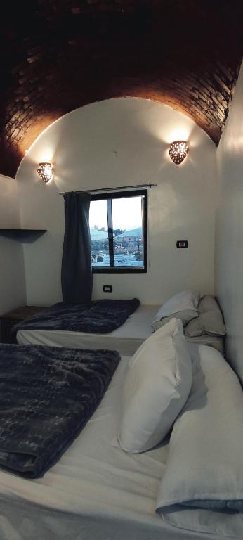 Letto o letti in una camera di Torya Nubian House