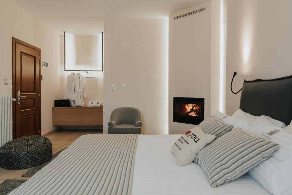 Ένα ή περισσότερα κρεβάτια σε δωμάτιο στο Anerada Hotel