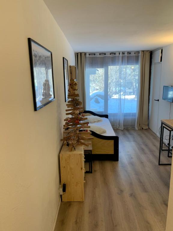 Posteľ alebo postele v izbe v ubytovaní Chez Greg les 2 ALPES
