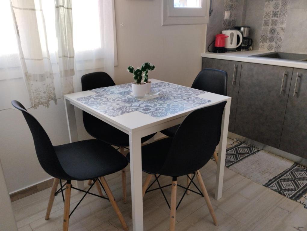 Kuchyňa alebo kuchynka v ubytovaní Cozy apartment in centre of Heraklion
