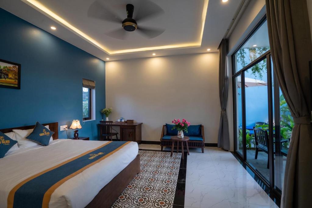 Postel nebo postele na pokoji v ubytování Coco Island Villa