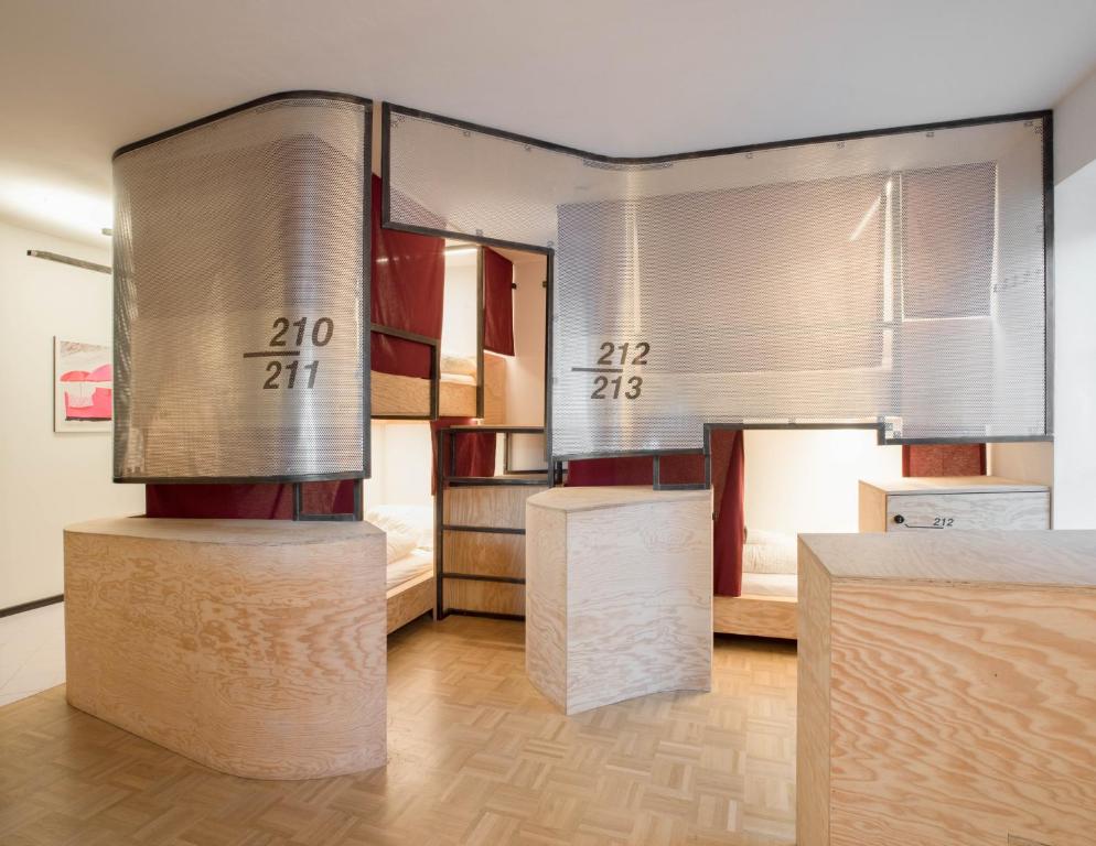 a room with a large display of kitchen cabinets at Montagu Hostel in Innsbruck