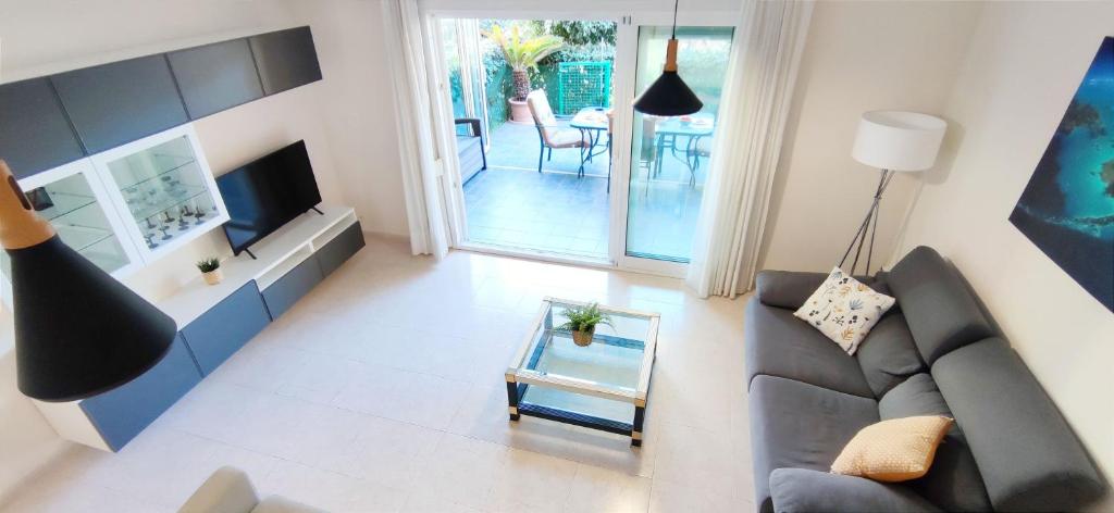 TV a/nebo společenská místnost v ubytování Apartamento Pont Sec by DENIA COSTA