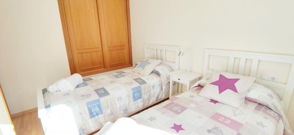 Postel nebo postele na pokoji v ubytování Apartamento Pont Sec by DENIA COSTA