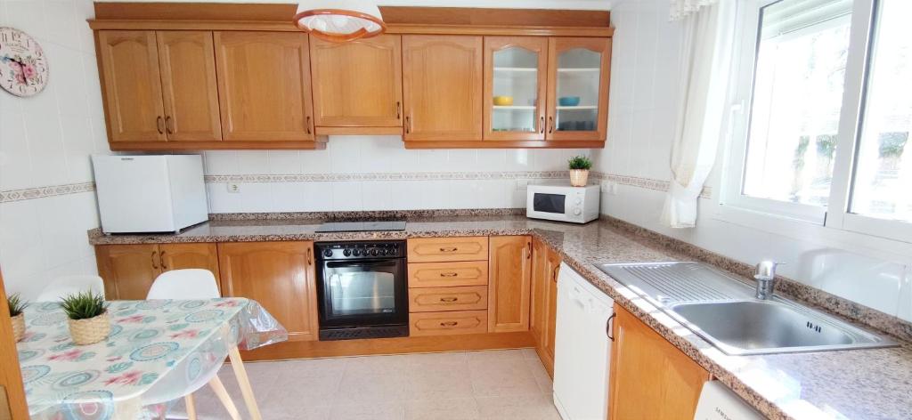 Kuchyň nebo kuchyňský kout v ubytování Apartamento Pont Sec by DENIA COSTA