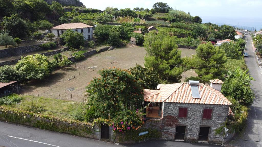 an aerial view of a house on a hill at Solar Arco de São Jorge in Santana