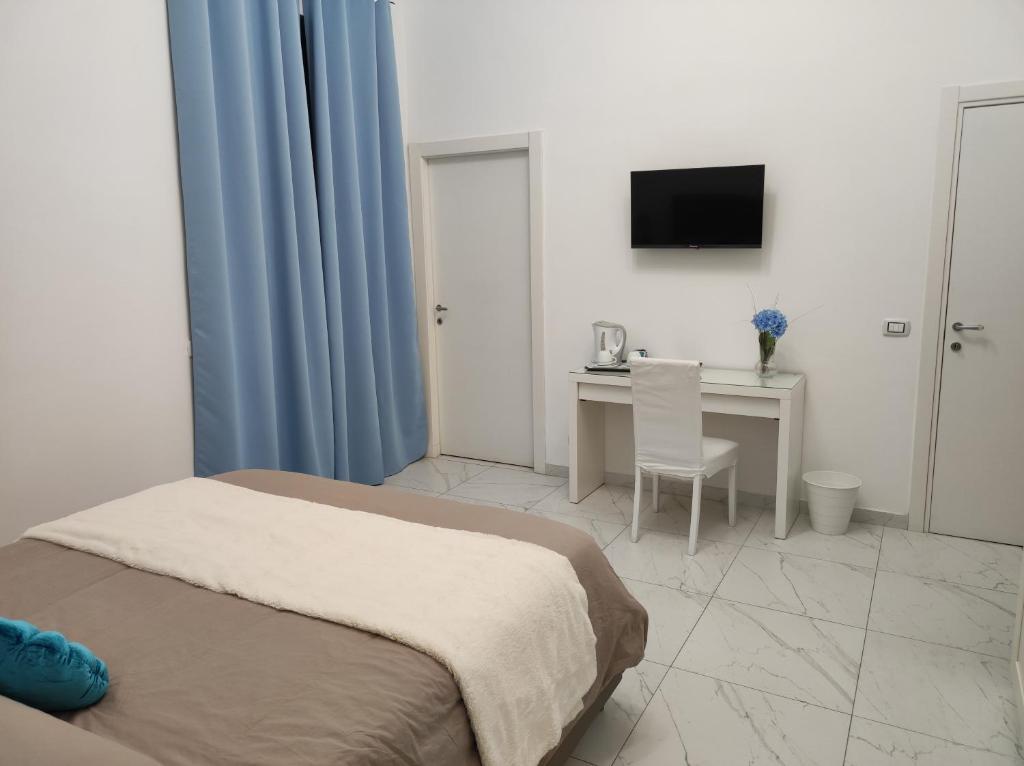 Letto o letti in una camera di Casa della Sibilla