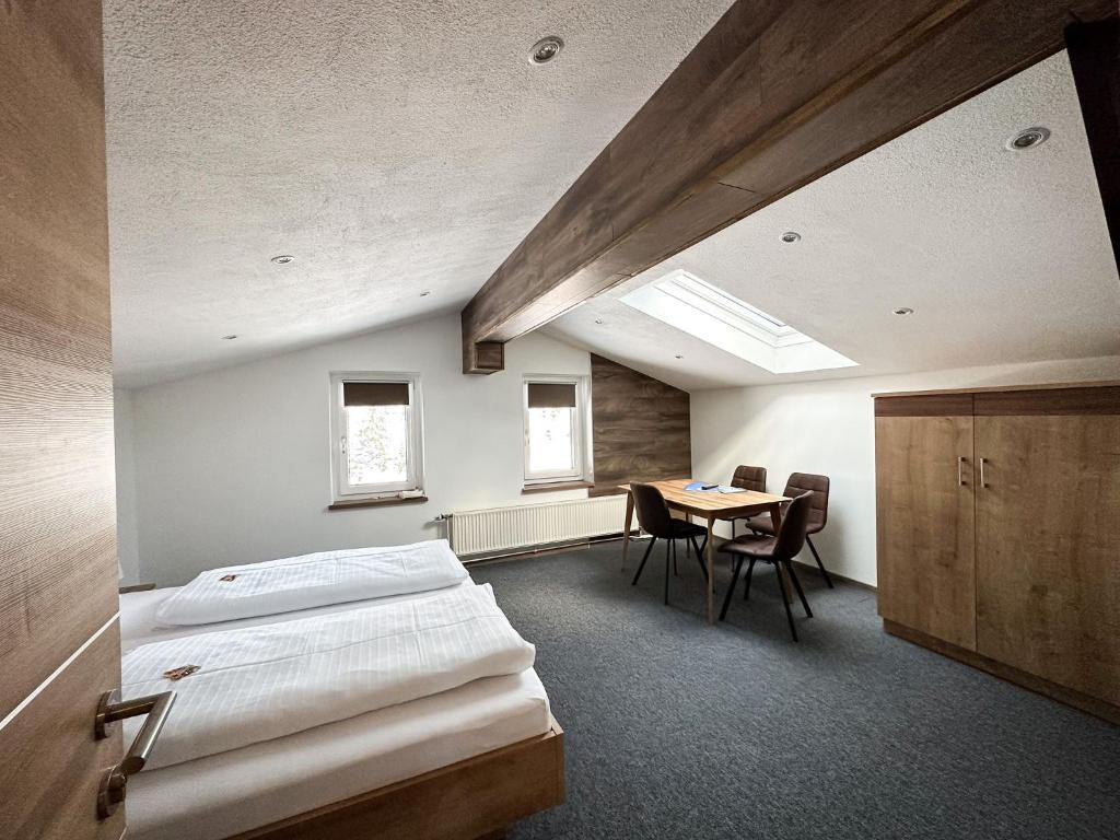 Postel nebo postele na pokoji v ubytování Frühstückspension Auer - Haus Kargl