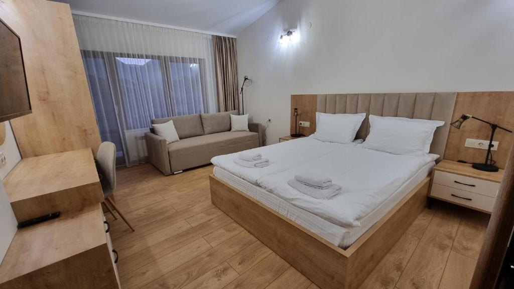 Postel nebo postele na pokoji v ubytování Guest House Gogemi