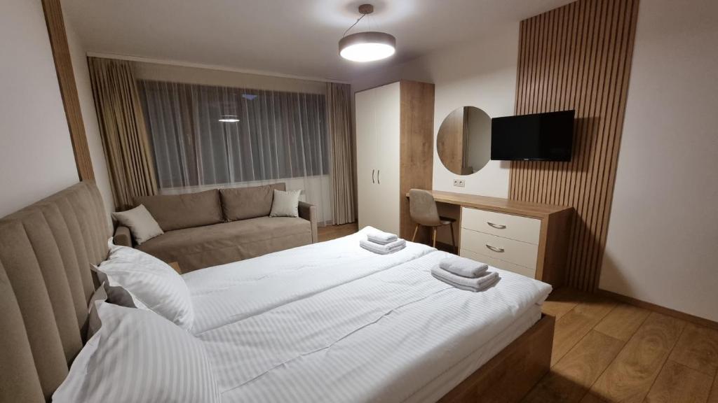 Postel nebo postele na pokoji v ubytování Guest House Gogemi