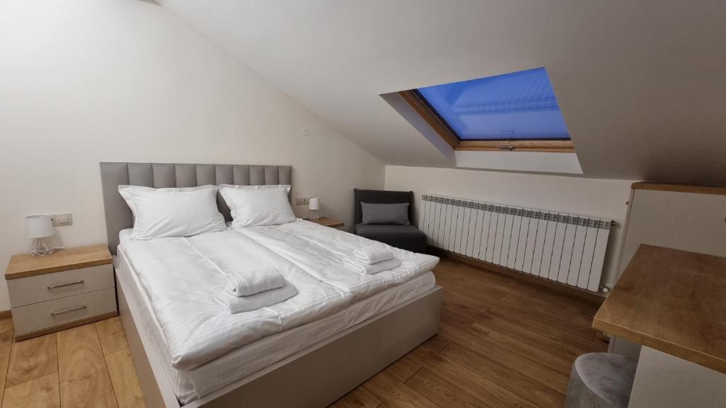 Postel nebo postele na pokoji v ubytování Guest House Gogemi