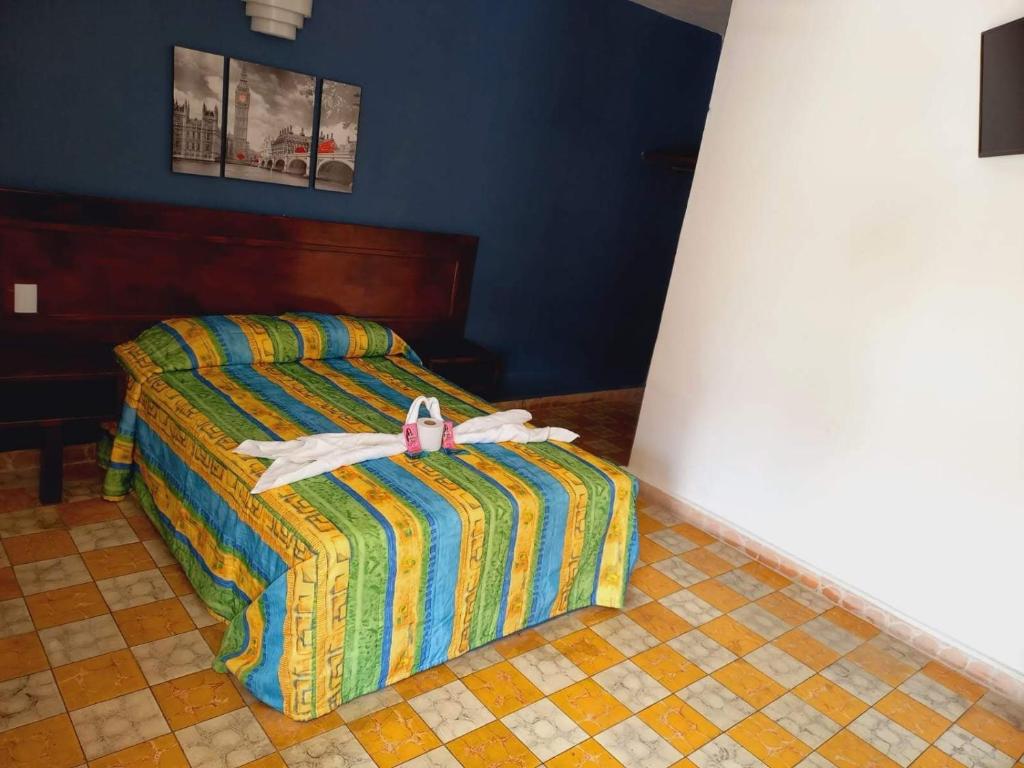 Postel nebo postele na pokoji v ubytování Hotel Verasol