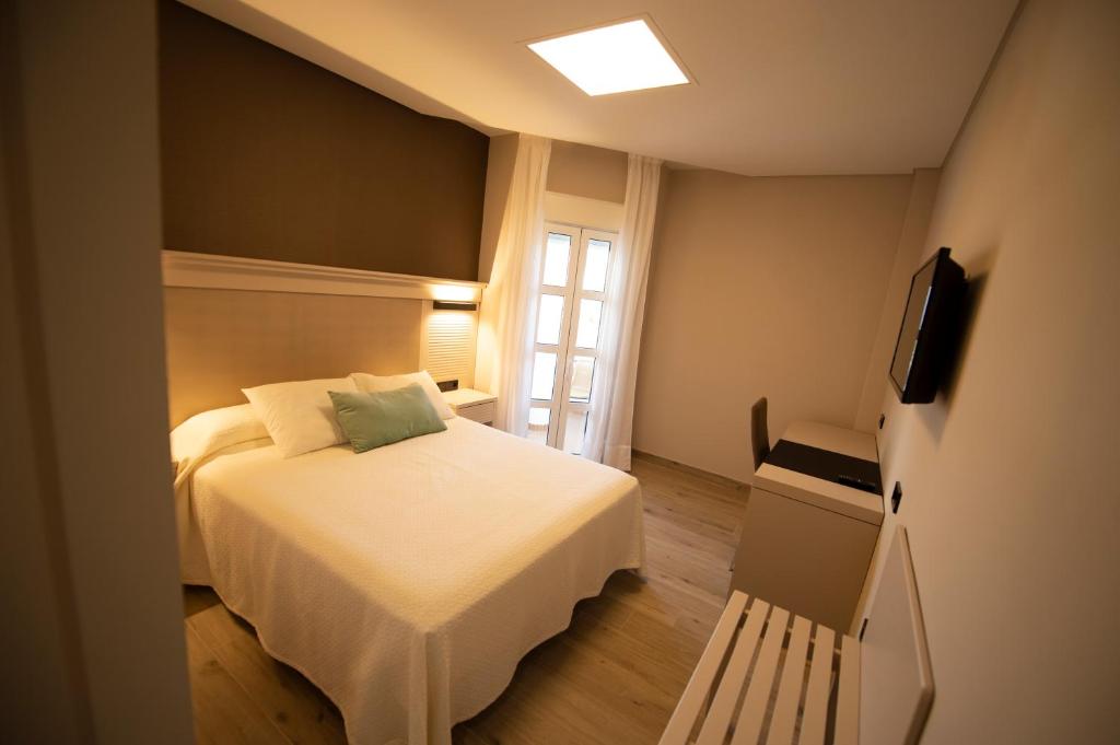 Posteľ alebo postele v izbe v ubytovaní Hotel Diufain