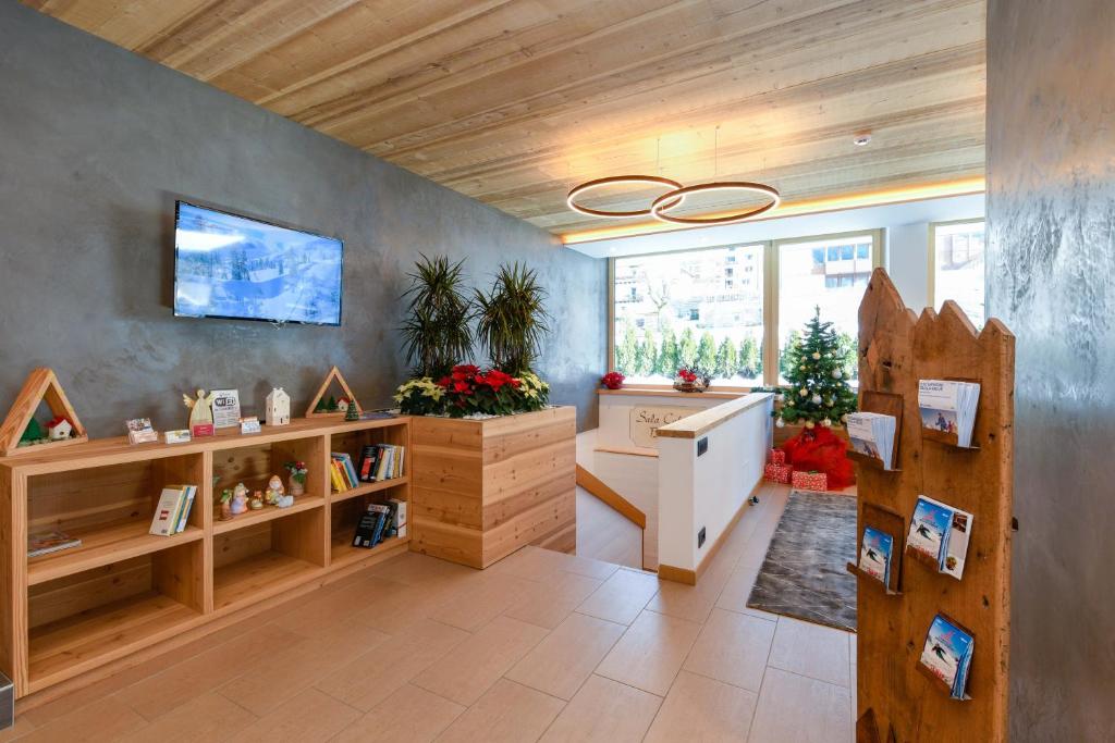 TV a/nebo společenská místnost v ubytování Bepy Hotel Garni