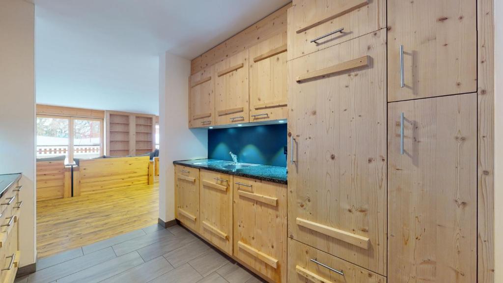 Kuchyň nebo kuchyňský kout v ubytování Les Mayens LUXURY & COSY apartments