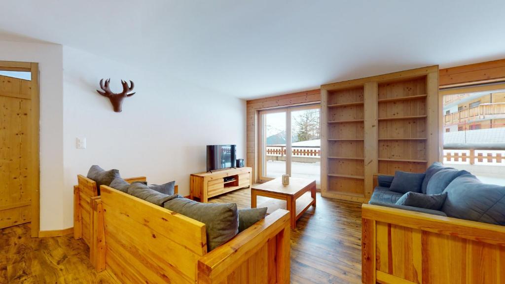 TV a/nebo společenská místnost v ubytování Les Mayens LUXURY & COSY apartments