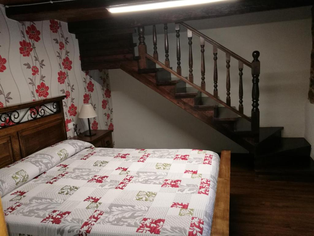 Postel nebo postele na pokoji v ubytování Casa de los Somoza