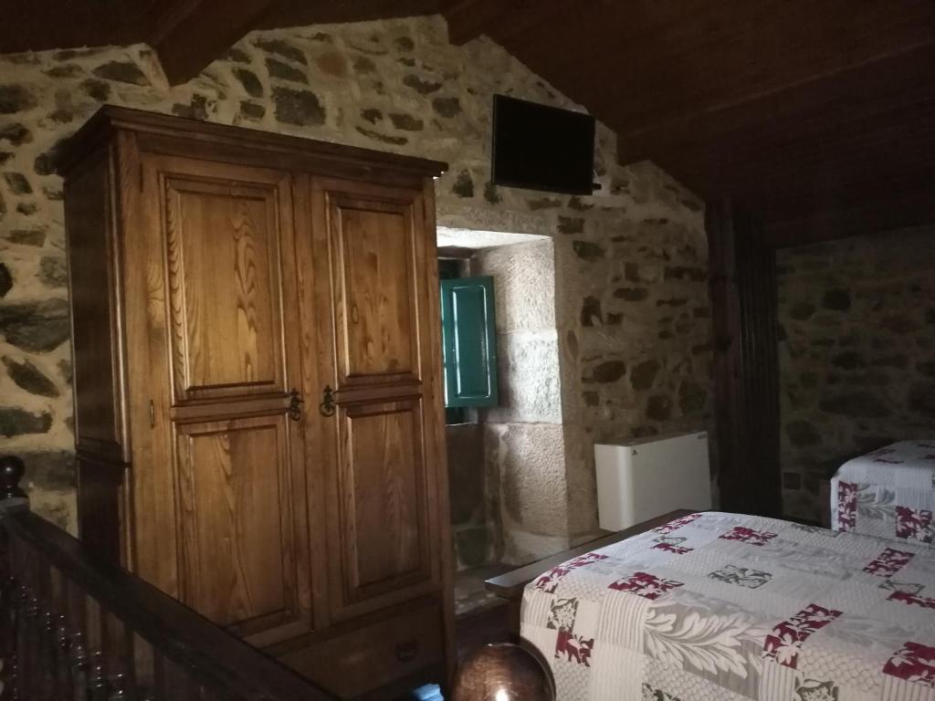 Postel nebo postele na pokoji v ubytování Casa de los Somoza