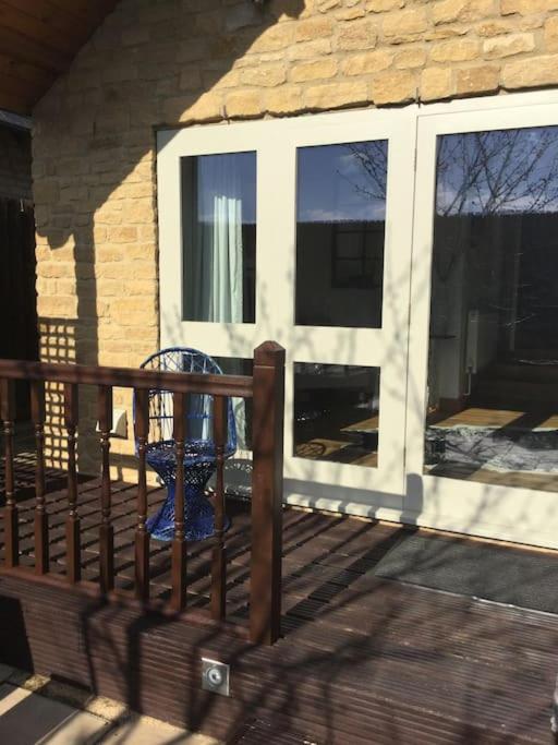 Balkón nebo terasa v ubytování 3 BEDROOM 5* BARN CONVERSION COTSWOLDS