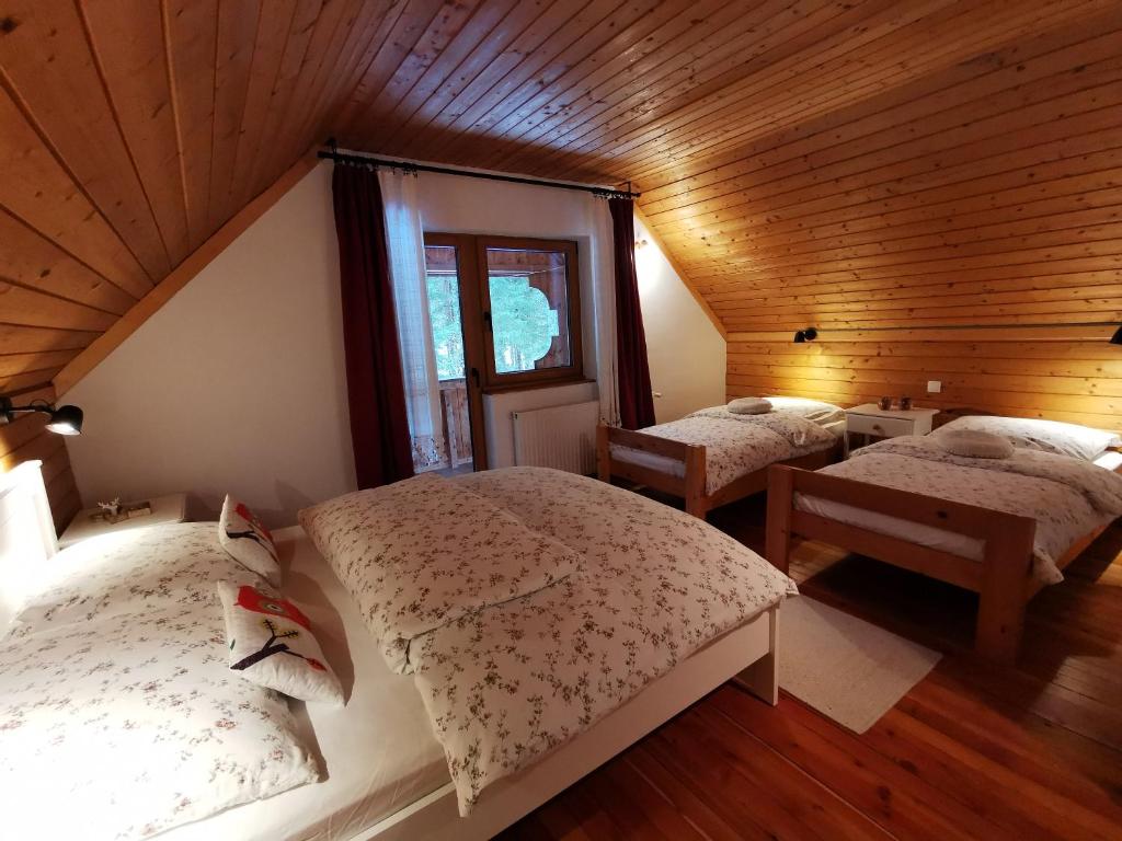 Postel nebo postele na pokoji v ubytování Chalet Via Mons