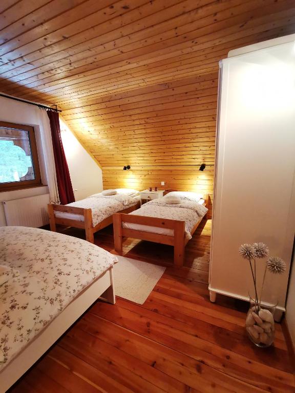 Postel nebo postele na pokoji v ubytování Chalet Via Mons