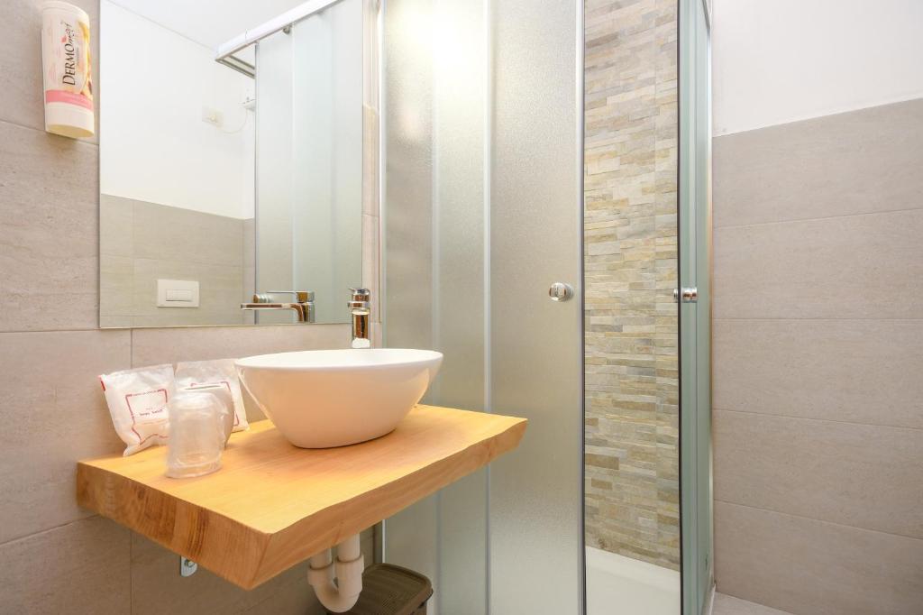 Koupelna v ubytování Bepy Hotel Garni