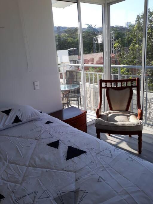 Postel nebo postele na pokoji v ubytování Con Piscina, Cómodo y acogedor Apartaestudio en el rodadero