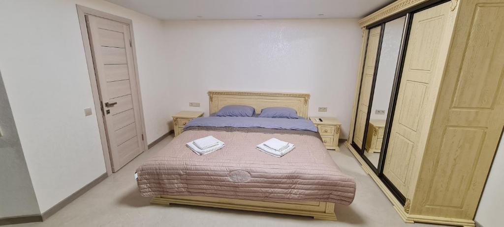 Postel nebo postele na pokoji v ubytování Viktan Hotel