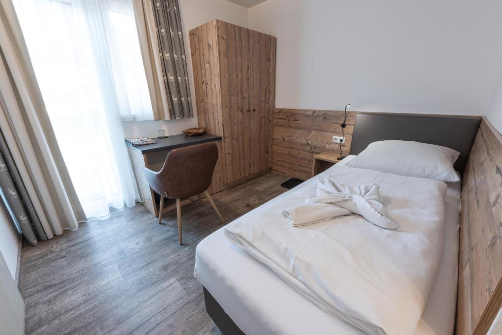 Letto o letti in una camera di Pension Rainer